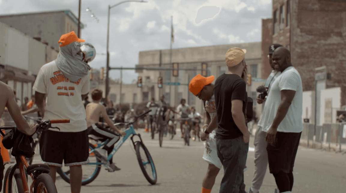Crash Boys community gathering in the street